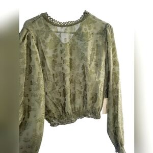 Green delicate see through top